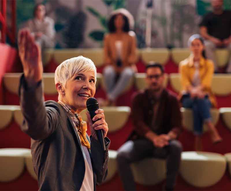 AM Ambassador giving speech to students